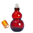 स्टेनलेस स्टील मालिश बॉल के साथ आवश्यक तेल की बोतलों पर कैलाबश एम्बर ग्लास ओडीएम रोल